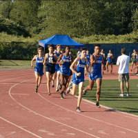 <p>Boys&#x27; Cross Country Varsity Team races at Staples High School</p>