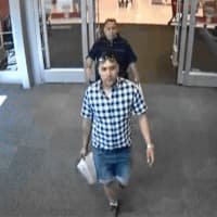 <p>Fairfield police released this photo of two men suspected of stealing credit cards at Trader Joe&#x27;s in Fairfield and using them at Target in Trumbull.</p>