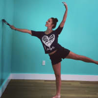<p>Danielle Peyton paints and dances in her new Cliffside Park studio.</p>