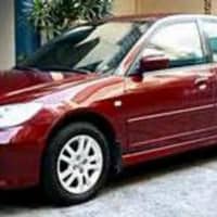 <p>Judith was driving a red 2004 Honda Civic similar to the one above.</p>