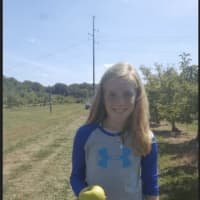<p>10-year-old Macie Mietz from Bethel visits Blue Jay Orchards for the first time.</p>