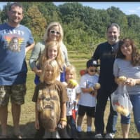 <p>The Mietz family with friends at Blue Jay Orchards in Bethel</p>