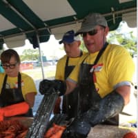 <p>The cooks worked hard at the lobster fest.</p>