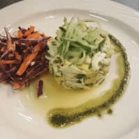 <p>The chilled crab &quot;cake&quot; with olive oil, lime, chives, carrot and red cabbage slaw at Cast Iron Chop House in Trumbull.</p>
