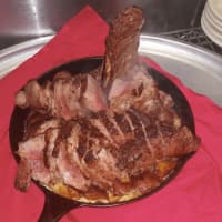 <p>Cast iron-cooked steaks are the star at Cast Iron Chop House.</p>
