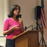 <p>Laura Simon, wildlife ecologist for the Humane Society of the United States speaking about coyotes in Stamford on Tuesday.</p>