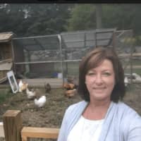 <p>Denise Darnell of Fairfield owns eight chickens and one rooster on her 2-acre property.</p>