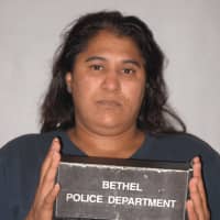 <p>Dilsa Collado, 43, of Nashville Road, Bethel is charged with stealing packages out of mailboxes.</p>