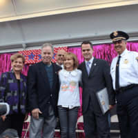<p>Grace VanderWaal, center, poses with Assemblywoman Ellen Jaffee, County Executive Ed Day, Suffern Mayor Ed Markunas, State Sen. David Carlucci, and County Sheriff Louis Falco.</p>