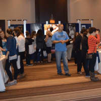 <p>Many people attend the Crowne Plaza Danbury’s Fall Bridal Expo.</p>