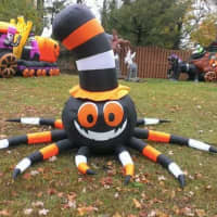 <p>Gina and Rich Martorana deck out their lawn with lots of inflatables come Halloween.</p>