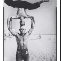 <p>&quot;Headstand, Muscle Beach&quot; by Larry Silver.  The photograph was taken in 1954, just when Muscle Beach achieved world renown and sparked a health and fitness movement that remains popular today.</p>
