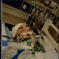 <p>Zach Standen of Easton shortly after his car accident in June.</p>