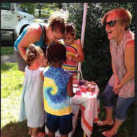 <p>Jill Newsome manning the Children&#x27;s Corner at the market</p>
