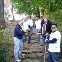 <p>Volunteers work on a trail project at Tarrywile Park &amp; Mansion in Danbury.</p>
