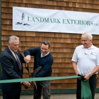 <p>Scott Teed of Landmark Exteriors joins Norwalk Mayor Harry Rilling in a ribbon cutting at the company&#x27;s expanded location in Norwalk.</p>