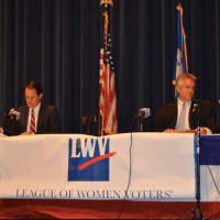 <p>Himes and Shaban engage in the debate at Wilton High School.</p>