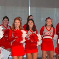 <p>Cheerleaders rev up the crowd at the announcement of the new Vantage Sports Network at Sacred Heart University.</p>