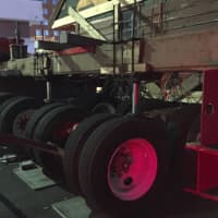 <p>Scales can be seen underneath the heavy-duty moving dolly for the Hoyt-Barnum House. The house exceeded its maximum weight and couldn&#x27;t be moved as planned on Sunday.</p>