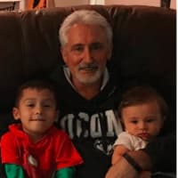 <p>Danbury resident Matt Corso, with his grandchildren, expressed doubts about President-elect Donald Trump.</p>