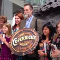 <p>Trumbull resident and children&#x27;s author Tony Abbott, center, will be among the panelists at a children&#x27;s book conference at Fairfield Public Library in December. His latest adventure series, is &quot;The Copernicus Legacy.&quot;</p>