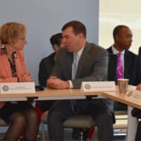 <p>Kathy Yacavone, CEO of Southwest Community Health Center in Bridgeport, chats with state Rep. Steve Stafstrom, D-129.</p>