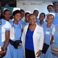 <p>Jackie Cassagnol of Spring Valley in the white lab coat, visited Haiti earlier this month to help train nurses in response to Hurricane Matthew.</p>