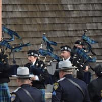 <p>Bagpipers line up to perform at a funeral process for Putnam County Undersheriff Peter Convery.</p>