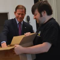 <p>U.S. Sen. Richard Blumenthal (D-Conn.) arrives at Luke’s Toy Factory on 128 E. Liberty St. in Danbury Wednesday morning to draw the name of the child who will receive a free toy.</p>
