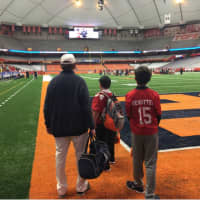 <p>Somers&#x27; Tony DeMatteo, the winningest coach in Section 1 history, takes in the atmosphere at the Carrier Dome prior to kickoff of the Tuskers&#x27; game.</p>