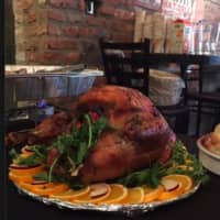 <p>Turkey was front and center at Little Drunken Chef&#x27;s annual free Thanksgiving buffet.</p>