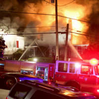 <p>The Scarsdale Boulevard home became engulfed in flames.</p>