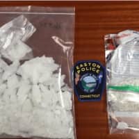 <p>Easton Police arrested a 24-year-old man on drug charges in connection with the seizure of $50,000 of crystal meth and $10 of Xanax pills.</p>