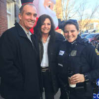 <p>Jack and Suzanne Testani with Greenwich Police Officer Kate Ciarleglio during Coffee with a Cop Tuesday in Greenwich.</p>