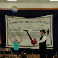 <p>Second-graders Sarah Ryan and Tommy Walsh participate in Patrick Garner&#x27;s presentation of The Wright Brothers and Sister.</p>