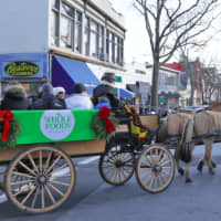 <p>There was a carriage ride on the holiday stroll in Greenwich.</p>