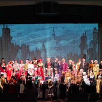 <p>The cast of &quot;A Christmas Carol&quot; with Broadway actor James Ludwig as Scrooge, at the end of a dress rehearsal at Walnut Hill Community Church in Bethel.</p>