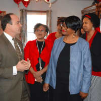 <p>Bridgeport Mayor Joe Ganim chats with Joann Smith in her new home on Oakwood Street.</p>