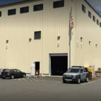 <p>The scenic design firm operates from this ordinary warehouse in Bridgeport.</p>