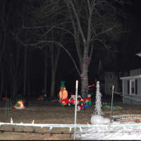 <p>Newtown’s Hawleyville Volunteer Fire Department lights up the night with its light show.</p>