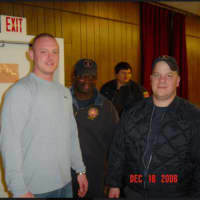 <p>Stratford firefighter Jason Carrafiello with some of his fellow firefighters. He passed away on Dec. 26.</p>