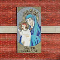 <p>The mosaic is on the side of the the Sacred Heart of Jesus Parish, at 46 Stone St. in Danbury.</p>
