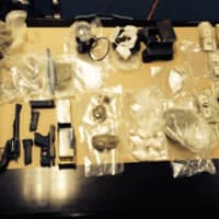 <p>Drugs, guns and money were seized in a Jan. 12 raid on a Bridgeport &#x27;drug factory.&#x27;</p>
