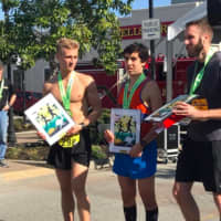 <p>Danbury&#x27;s Ryan Fox, middle, finished second in his debut marathon on Saturday in Charleston, S.C.</p>
