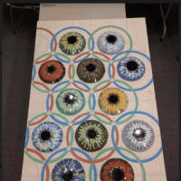 <p>The project, called “Eyes of the World,” is a mural that will be made of broken ceramic tile pieces, adhered to a board. Participants will put corresponding color tile pieces onto the board, where that same color will be painted.</p>