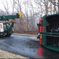 <p>The garbage truck rolled over at around 5:30 a.m. Thursday.</p>