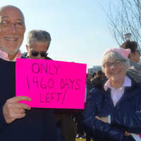 <p>Westport residents Stanley and Susan Witkow hold up an anti-Trump sign at the Women&#x27;s March on Stamford.</p>