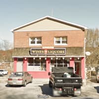 <p>The proprietor of a Newtown liquor store that was set on fire and vandalized has been charged with arson and insurance fraud, among other charges.</p>