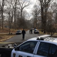 <p>Norwalk Police tape off road where a pursuit died after a police pursuit.</p>
