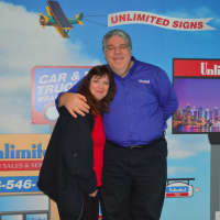 <p>New Fairfield couple Mike and Marian Goldstein at their newly expanded Brookfield sign business, Unlimited Signs, Designs &amp; Graphics.</p>